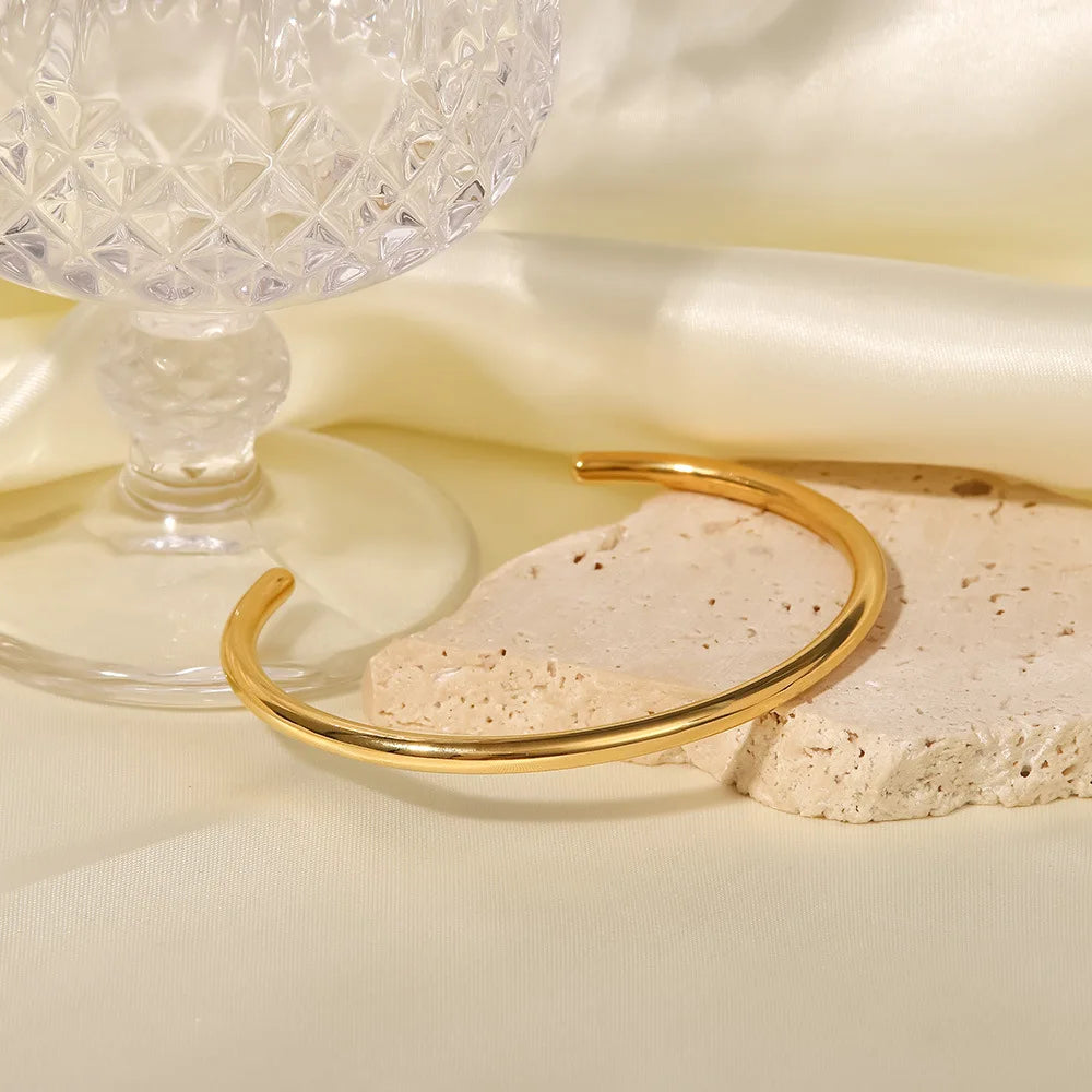 Minimalistische open manchetarmband verguld